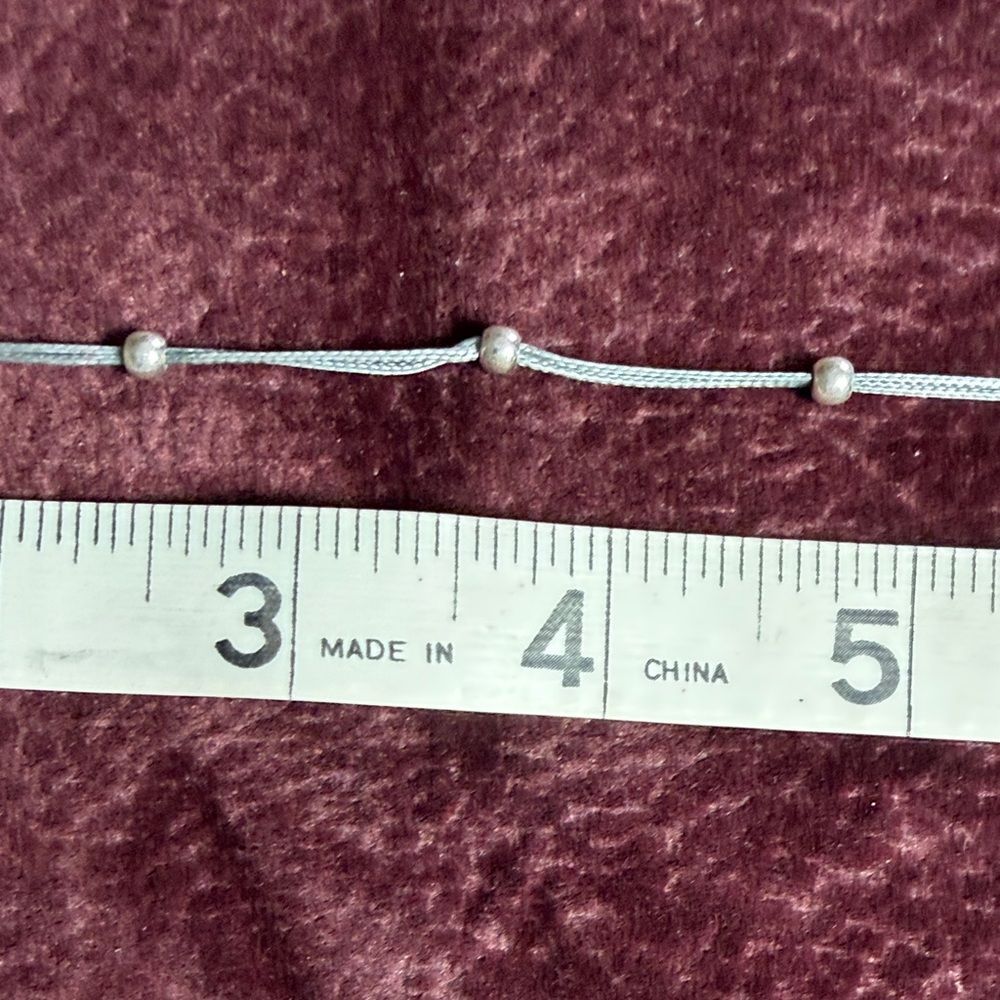 Claire's Silver Tone Beaded Cord Bracelet - Picture 5 of 8